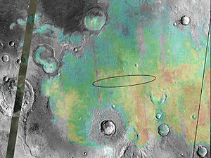 Aufnahme von Meridiani Planum. Die Hämatitvorkommen sind farblich markiert worden. Die Ellipse bezeichnet das Landegebiet der Sonde Opportunity