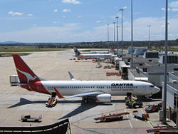 Melbourne Airport T1 with Qantas and Jetstar jets.jpg