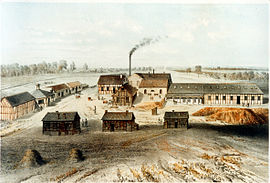 Lithographie von der Grube Julien 1855, links: Stallungen, Schlosserei, Stellmacherei, Mitte: Schachtanlage mit Maschinenhaus, rechts: Aufbereitungsanlage, Vordergrund: drei Steigerhäuser, die heute noch stehen